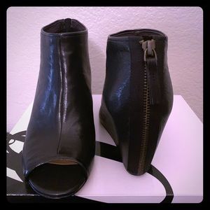 Black wedge booties